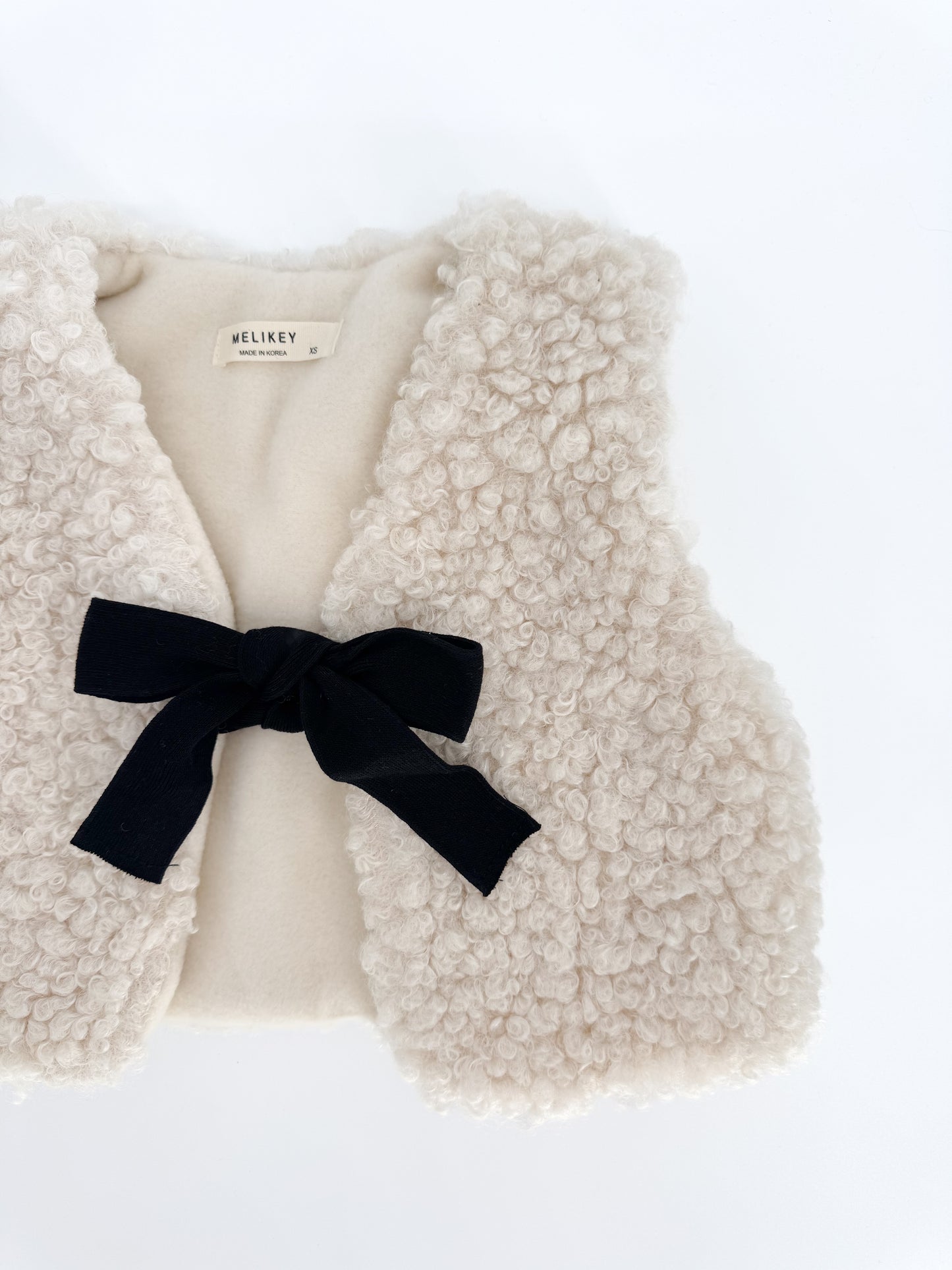 Sherpa bow vest